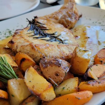 Cavatappi NYC - a plate of chicken and potatoes - Italian Near Me - Brooklyn, New York