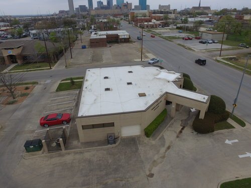 Slide of Dynasty Roofing