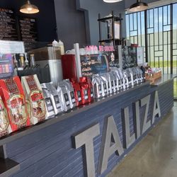 Taliza Coffee - Front counter. Clean and welcoming.