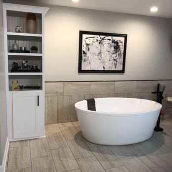 Willis Builders - a bathtub in a bathroom - General Contractors Near Me - Frankfort, Illinois Willis Builders - a bathtub in a bathroom - General Contractors Near Me - Frankfort, Illinois