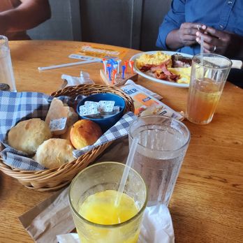 Cracker Barrel Old Country Store - Biscuits and corn bread basket with butter and steak Eggs and Ham in the distance - Breakfast & Brunch Near Me - Hagerstown, Maryland Cracker Barrel Old Country Store - Biscuits and corn bread basket with butter and steak Eggs and Ham in the distance - Breakfast & Brunch Near Me - Hagerstown, Maryland