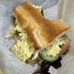 1/2 egg salad sandwich on baguette. 1/2 egg salad sandwich on baguette.
