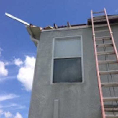 Slide of A Manos Roofing