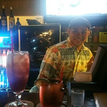 Genius Lounge - Our bartender. Forgotten the drink names though. Center one was like a moscow mule? - Japanese Near Me - Honolulu, Hawaii Genius Lounge - Our bartender. Forgotten the drink names though. Center one was like a moscow mule? - Japanese Near Me - Honolulu, Hawaii