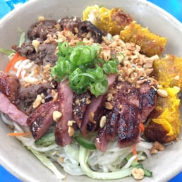 Grilled beef, spring roll, and marinated pork with vermicelli Grilled beef, spring roll, and marinated pork with vermicelli