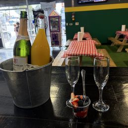 Champagne, orange juice (mimosas), and fruit!
