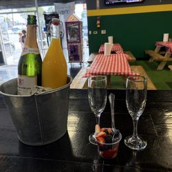 Batters Box - Champagne, orange juice (mimosas), and fruit!