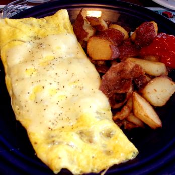 Varsity Inn - Aunt Helen's omelette w. kielbasa, onions, and Swiss cheese accompanied by hash browns - Breakfast & Brunch Near Me - Ocean City, New Jersey Varsity Inn - Aunt Helen's omelette w. kielbasa, onions, and Swiss cheese accompanied by hash browns - Breakfast & Brunch Near Me - Ocean City, New Jersey