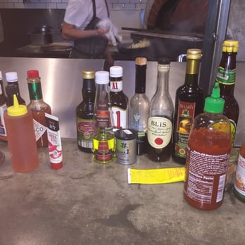 Industrial Eats - Can you say "Condiments"?   Enough spices and sauces for just about anyone. - Pizza Near Me - Buellton, California