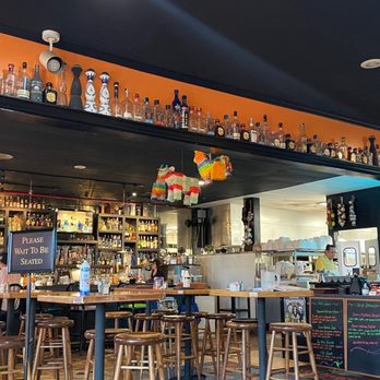 San Marcos Grill - a bar with a lot of bottles on the wall - Bars Near Me - Carson City, Nevada San Marcos Grill - a bar with a lot of bottles on the wall - Bars Near Me - Carson City, Nevada