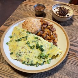 The Gap Café by Perini Ranch - Three-egg omelette with breakfast potatoes, a biscuit, salsa, and a side of sausage gravy