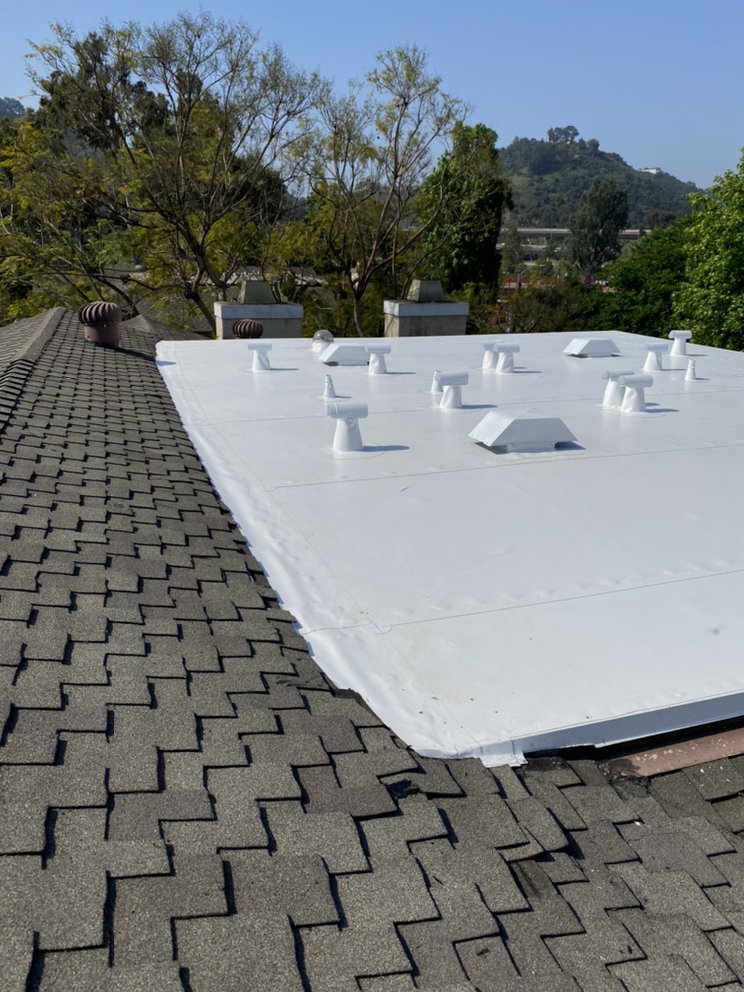 Slide of R&J Roofing