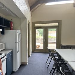 Glen Lake Camp & Retreat Center - Full size stove, oven, microwave, & fridge on left of pic.
