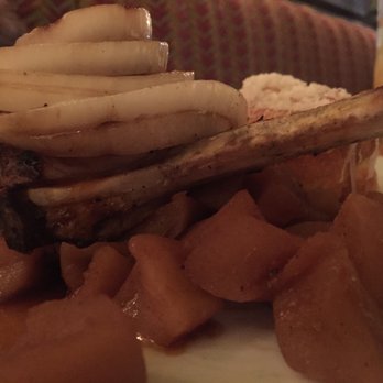 Fat Canary - Heritage Breed Pork Chop, goat cheese soufflé,golden apple sauce, grilled onions - New American Near Me - Williamsburg, Virginia
