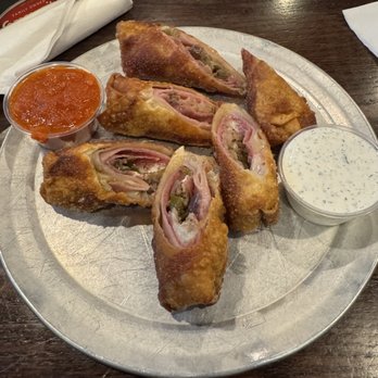 Misfits Dine And Drink - Muffaletta Eggrolls - Italian Near Me - Broussard, Louisiana Misfits Dine And Drink - Muffaletta Eggrolls - Italian Near Me - Broussard, Louisiana