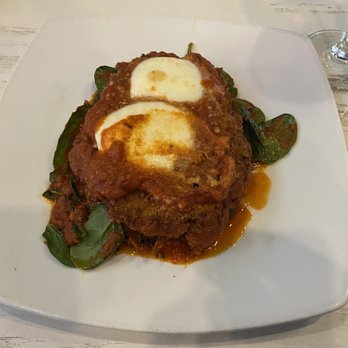 Savor Restaurant - Chicken parm on a bed of spinach. - Seafood Near Me - Carmel, Indiana