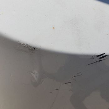 Firestone Complete Auto Care - Clearly some sort of fill in or touch up something was used here.  Spoke with 3 local body shops who all agreed with such thinking. - Tires Near Me - Roseville, Michigan