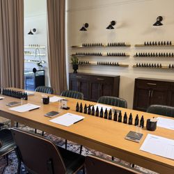 Capsule Parfumerie - Materials line the walls for workshops