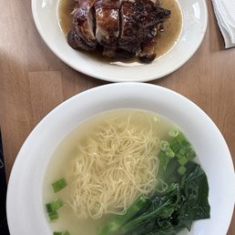 Noodle soup and duck on the side.