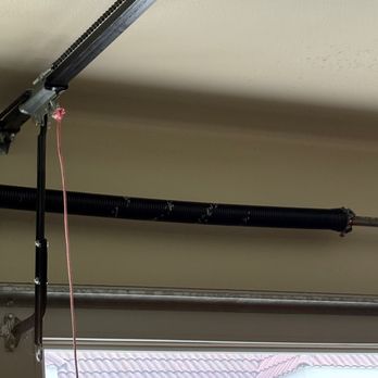 Next Level Garage Doors & Gates - Fixed spring - closeup - Fences & Gates Near Me Next Level Garage Doors & Gates - Fixed spring - closeup - Fences & Gates Near Me