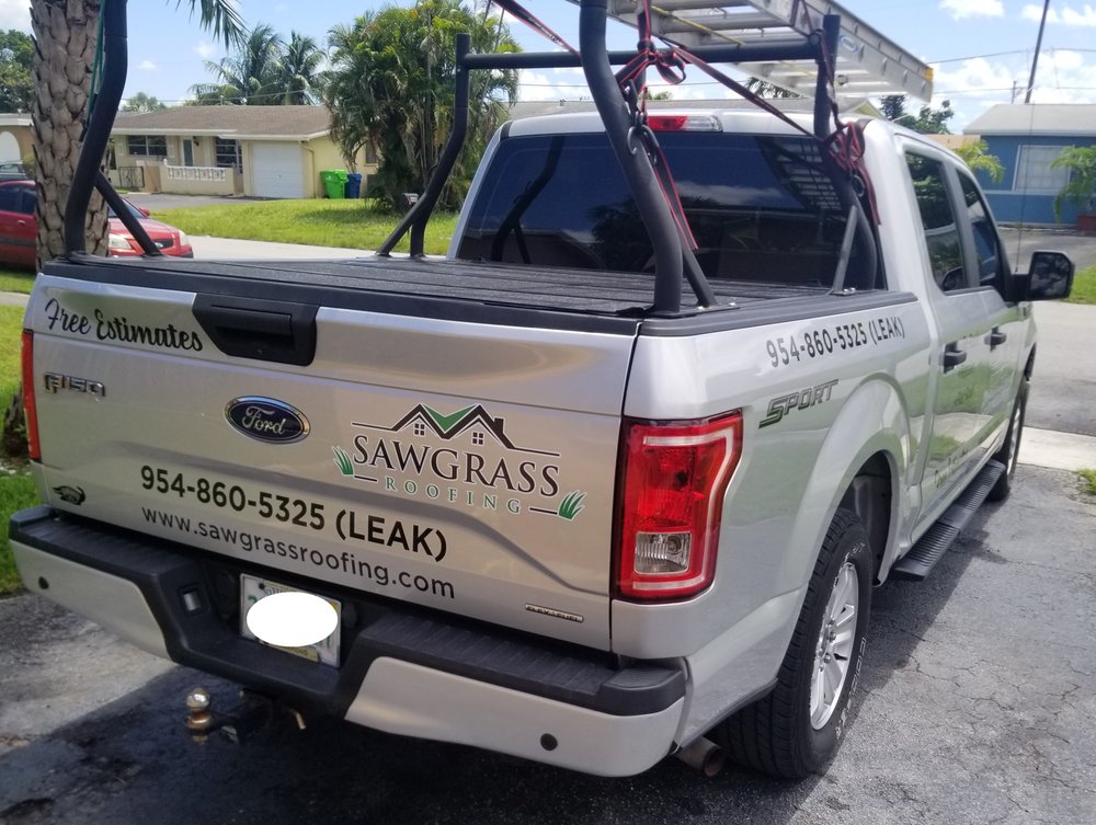 Slide of Sawgrass Roofing
