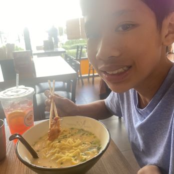 Monsta Ramen - Tonkotsu ramen and on his chopstick is the volcano karaage chicken. strawberry lemonade. - Japanese Curry Near Me - San Diego, California Monsta Ramen - Tonkotsu ramen and on his chopstick is the volcano karaage chicken. strawberry lemonade. - Japanese Curry Near Me - San Diego, California