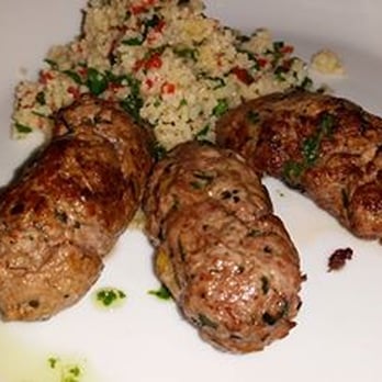 Lemon Mediterranean Restaurant - Merguez Lamb Sausage grilled & served over Tabbouleh Salad - Mediterranean Near Me - Freehold, New Jersey Lemon Mediterranean Restaurant - Merguez Lamb Sausage grilled & served over Tabbouleh Salad - Mediterranean Near Me - Freehold, New Jersey