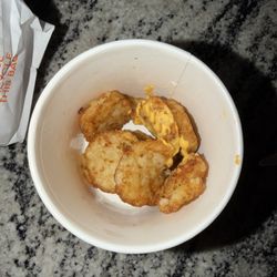 Dunkin' - This is a cheesy hash brown. An extra $3 for a spec of cheese..