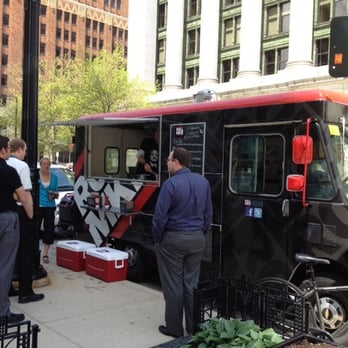 Roll MKE - a group of people standing in front of a food truck - Food Trucks Near Me - Milwaukee, Wisconsin