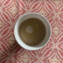 This is my $8.45 quad shot cinnamon dolce latte.... Just wondering what happened to the rest of it.... This is my $8.45 quad shot cinnamon dolce latte.... Just wondering what happened to the rest of it....