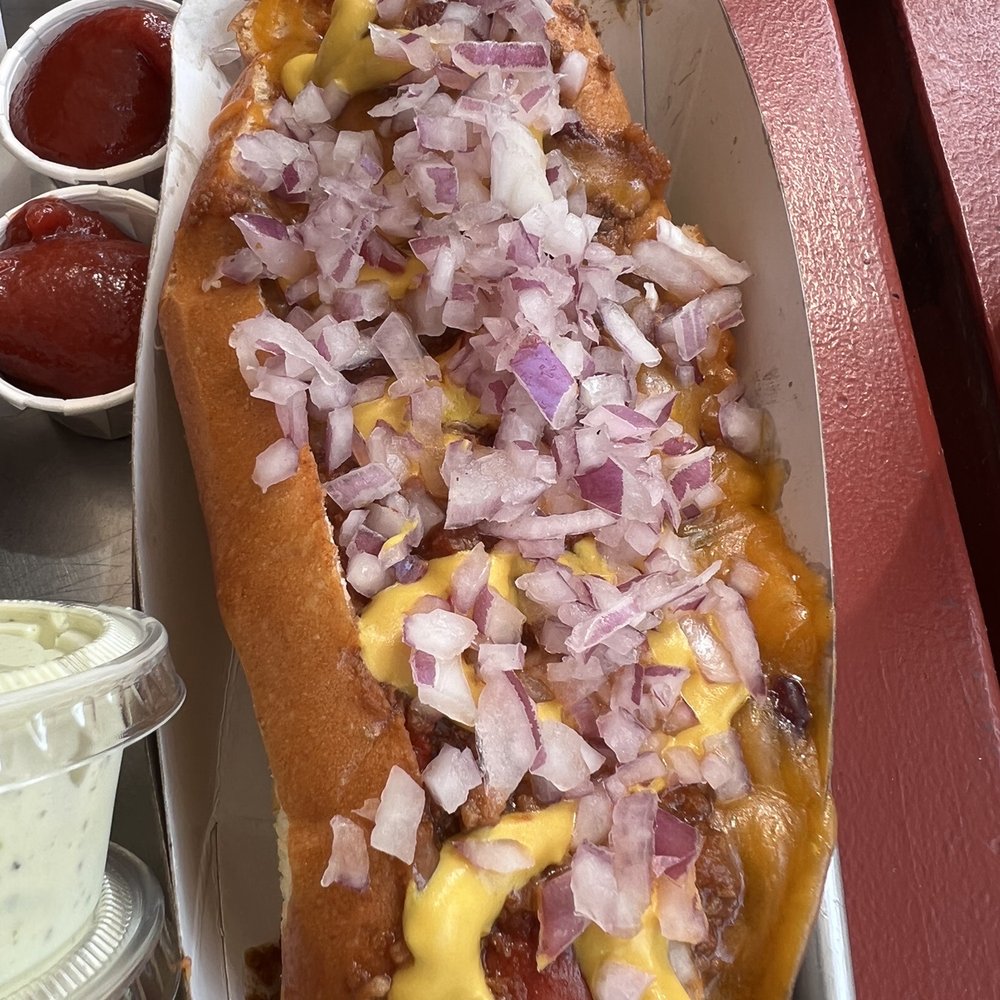 Gott's St. Helena - Chili Cheese Dog - A bit messy and knife/fork needed but still tasty. Solid high quality dog and the chili has beans FYI. - Burgers Near Me - Saint Helena, California Gott's St. Helena - Chili Cheese Dog - A bit messy and knife/fork needed but still tasty. Solid high quality dog and the chili has beans FYI. - Burgers Near Me - Saint Helena, California