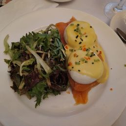 Smoked Salmon Eggs Benedict with the accompanying greens in very light dressing. Smoked Salmon Eggs Benedict with the accompanying greens in very light dressing.
