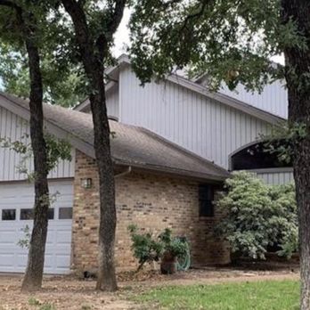 Meadows Garage Door Repair & Installation - This was the house when we purchased it a few months ago. The garage door panel of windows was too low for me to feel comfortable. - Garage Door Services Near Me - Roanoke, Texas