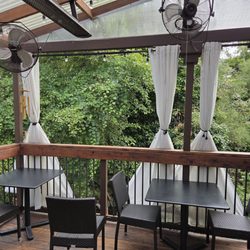 The tranquil patio out back overlooking a creek