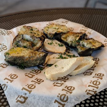 Ulele - Charbroiled Oysters(Barbacoa-grilled, with garlicbutter, grated Parmesan andRomano cheeses) - New American Near Me - Tampa, Florida