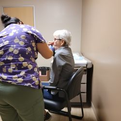 Bagheri Kaveh, MD - My mother being administered a breathing test.