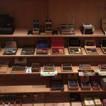 Ocoee Cigar Lounge - a shelf of cigars - Cigar Bars Near Me - Cleveland, Tennessee