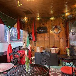 Yazzolino’s Cosa Bella Italian Kitchen - Nice warm covered seating area with 5 tables