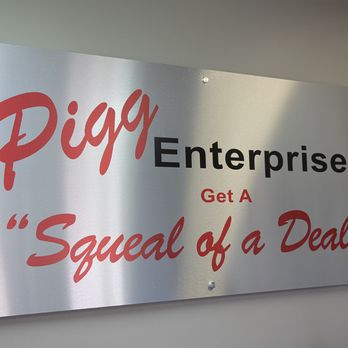 Pigg Enterprises - Pigg Enterprises welcomes customers with our signature motto, "Get a Squeal of a Deal," proudly displayed in our showroom. - Car Dealers Near Me - Prattville, Alabama Pigg Enterprises - Pigg Enterprises welcomes customers with our signature motto, "Get a Squeal of a Deal," proudly displayed in our showroom. - Car Dealers Near Me - Prattville, Alabama