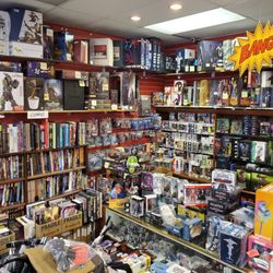 Comic-Kazi - Ceiling to floor choices galore of statues, action figures, apparel, kitchenware, novelty collector items