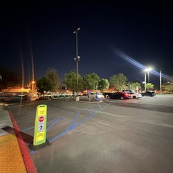 Best Buy - The store manager does not care that the parking lot is extremely dark because the light is out.