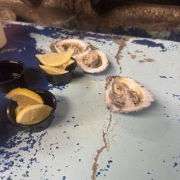 Raw oyster!!!! Just with lemon. Raw oyster!!!! Just with lemon.