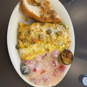 Eggs Up Grill - Shrimp & Grits omelette - Breakfast & Brunch Near Me - Riverview, Florida Eggs Up Grill - Shrimp & Grits omelette - Breakfast & Brunch Near Me - Riverview, Florida