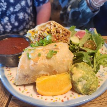 PublicUs - My friends got the tofu scramble burrito. It was enough for two people - Coffee & Tea Near Me - Las Vegas, Nevada