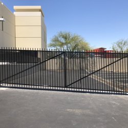Coachella Valley Custom Gate & Fence - Tubular steel commercial security fence with access gate in Palm Desert.