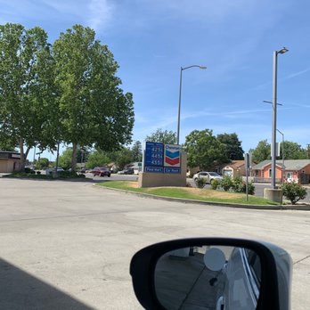 Chevron - a view of a motel from a car window - Gas Stations Near Me - West Sacramento, California
