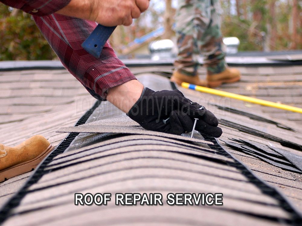 Slide of Ed's Roofing