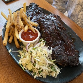 Tommy Bahama Restaurant - Grilled Baby Back Pork Ribs - Full - Cocktail Bars Near Me - Jupiter, Florida Tommy Bahama Restaurant - Grilled Baby Back Pork Ribs - Full - Cocktail Bars Near Me - Jupiter, Florida
