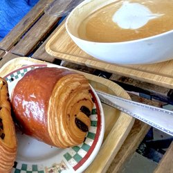 Dora Boulangerie & Café - Chocolate croissant and latte.
