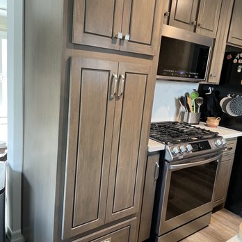 Hardwood Construction - a kitchen with stainless steel appliances - General Contractors Near Me - Laguna Beach, California